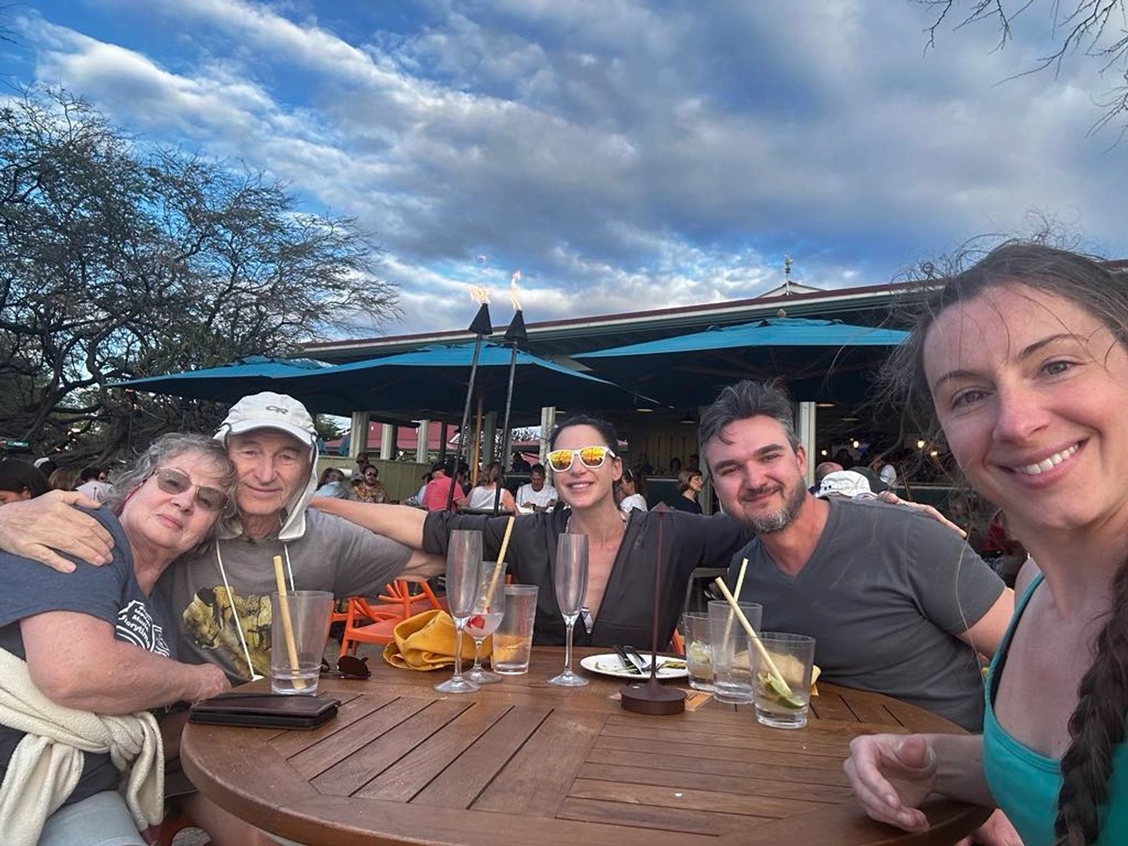 Group of friends sharing drinks at a restaurant